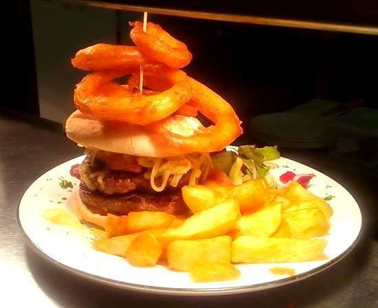 Отель Portrush Adelphi Экстерьер фото A burger with onion rings
