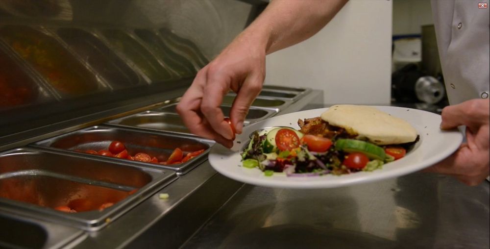 Отель Portrush Adelphi Экстерьер фото A salad being prepared at a salad bar